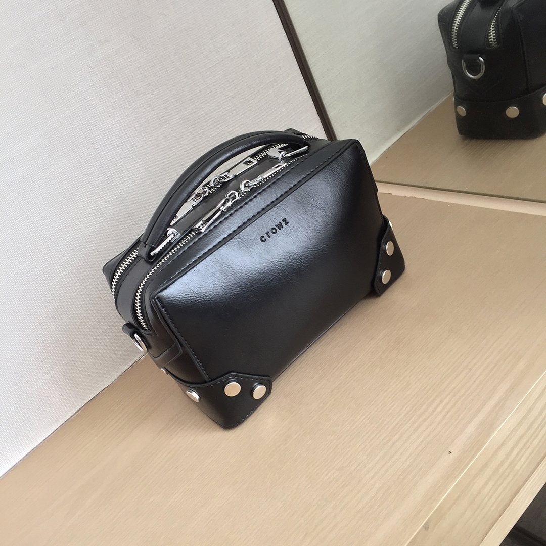 Studded corner marble-effect creased PU leather bag