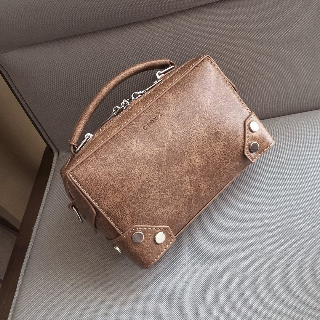 Studded corner marble-effect creased PU leather bag