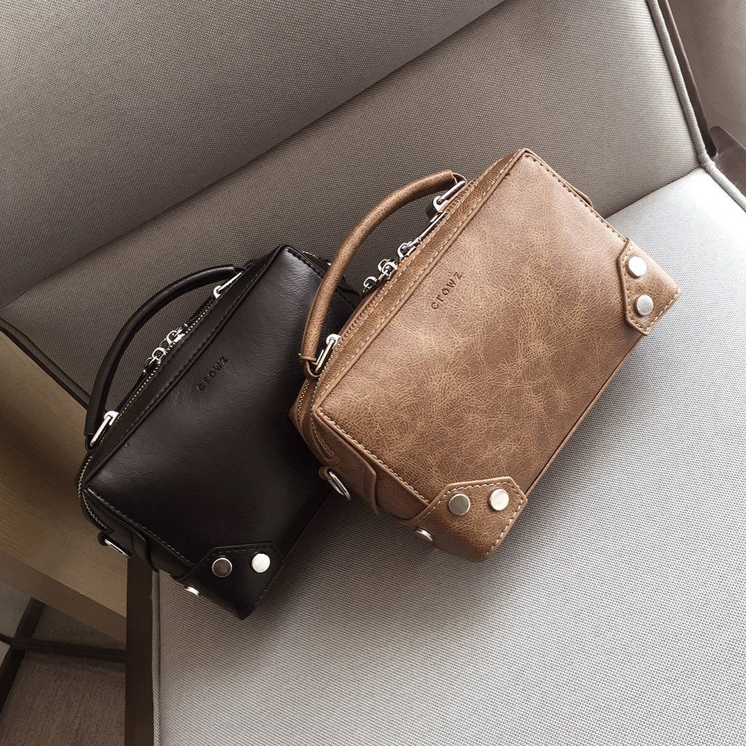 Studded corner marble-effect creased PU leather bag