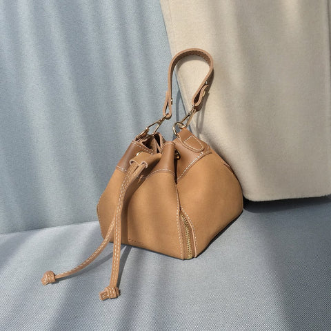 Zip detail drawstring dual compartment PU leather bucket bag