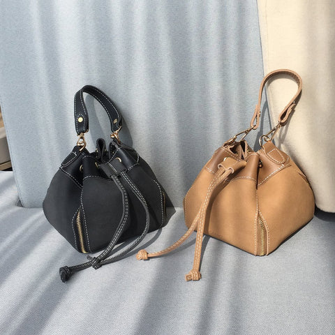 Zip detail drawstring dual compartment PU leather bucket bag