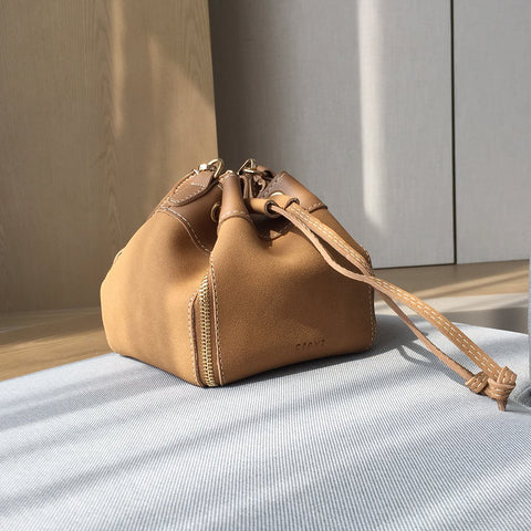 Zip detail drawstring dual compartment PU leather bucket bag
