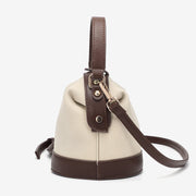 Retro snap-fastening cylindrical PU leather bucket bag