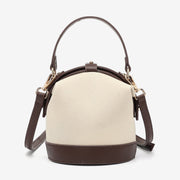 Retro snap-fastening cylindrical PU leather bucket bag