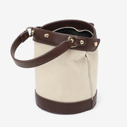 Retro snap-fastening cylindrical PU leather bucket bag