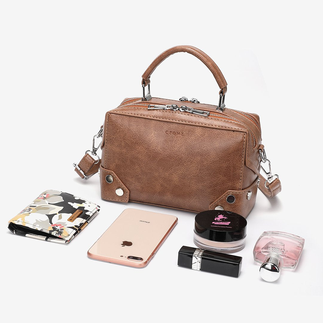 Studded corner marble-effect creased PU leather bag