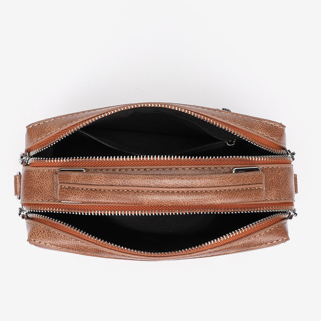 Studded corner marble-effect creased PU leather bag