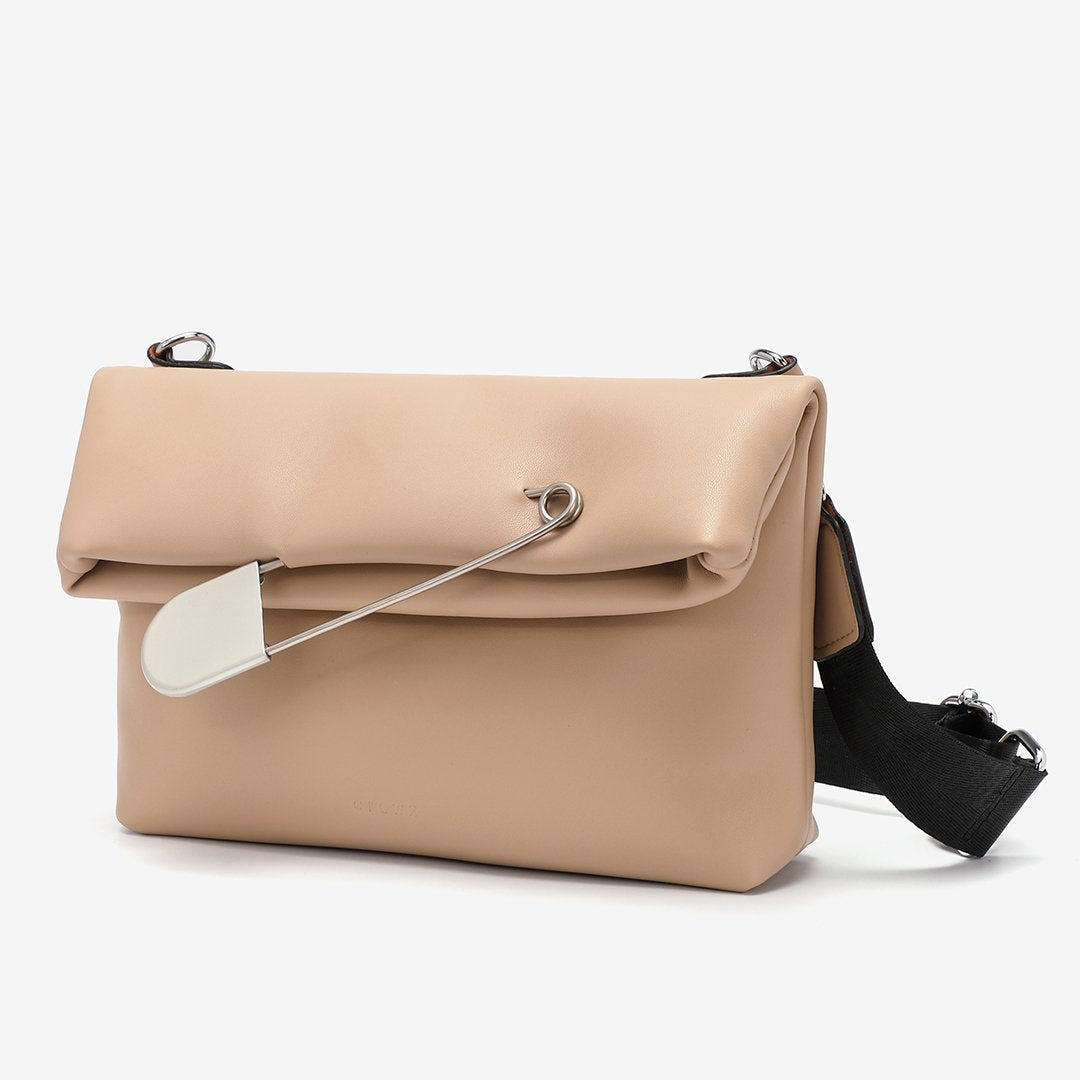 Safety pin embellished flap crossbody bag