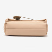 Safety pin embellished flap crossbody bag