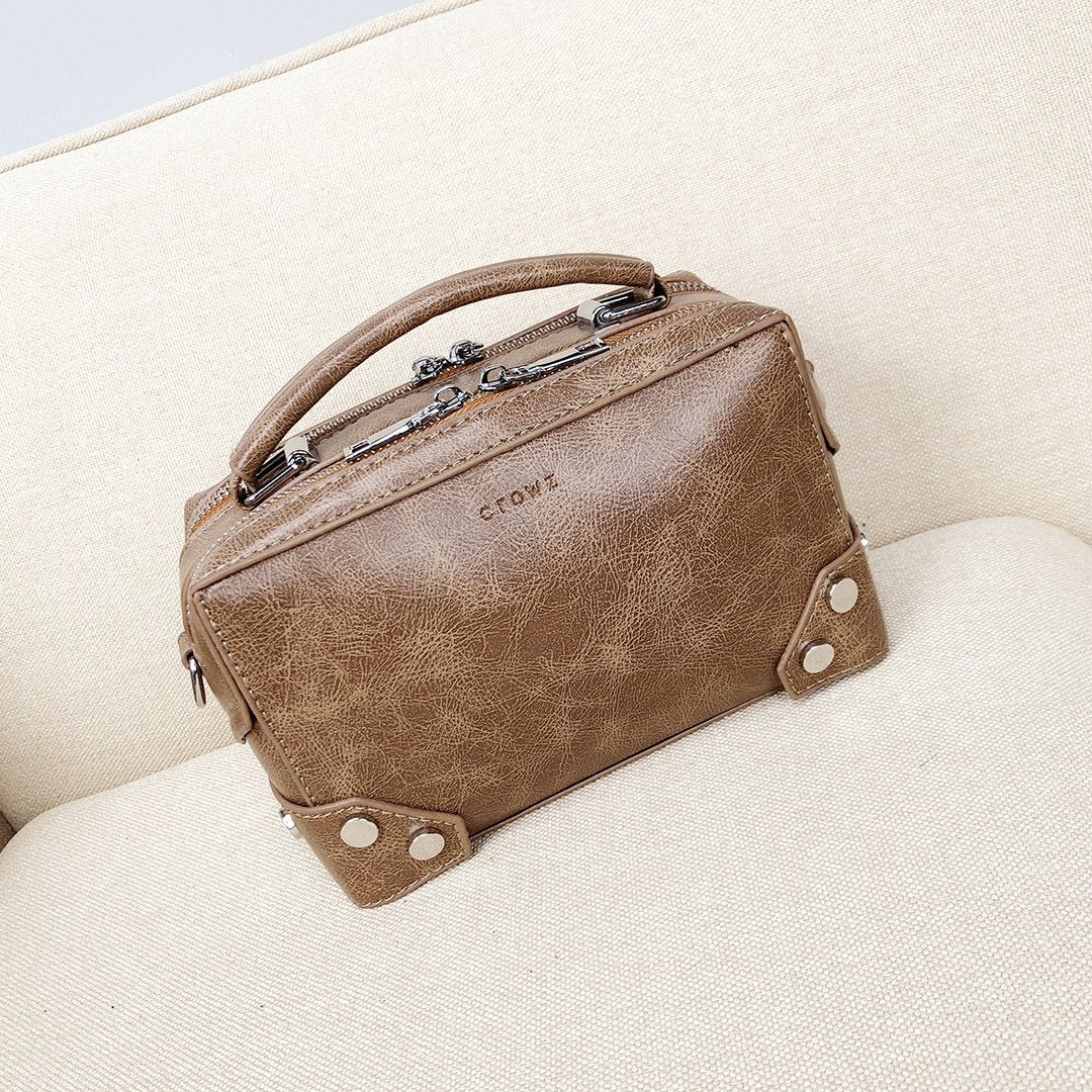 Studded corner marble-effect creased PU leather bag