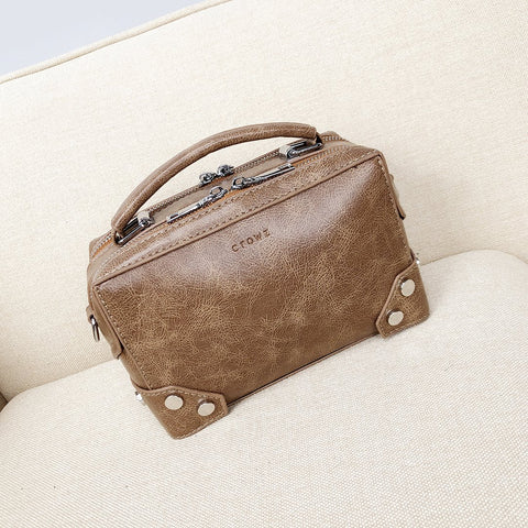Studded corner marble-effect creased PU leather bag