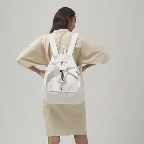 Buckle strap folded corners canvas backpack