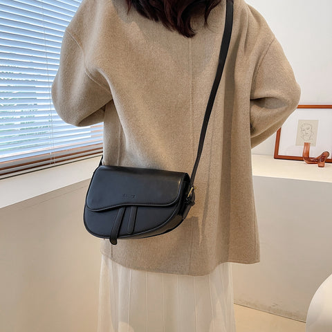 Retro strap detail flap sculptural PU leather saddle bag
