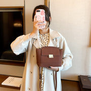 Modern metal-closure flap sculptural faux suede crossbody bag