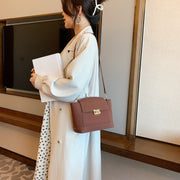 Modern metal-closure flap sculptural faux suede crossbody bag