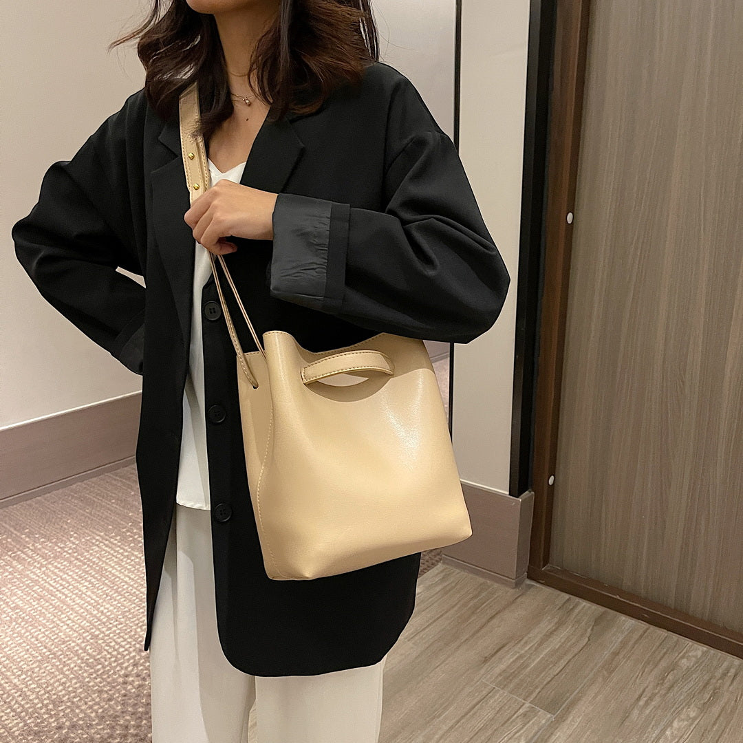 Modern minimalistic smooth PU leather bucket bag