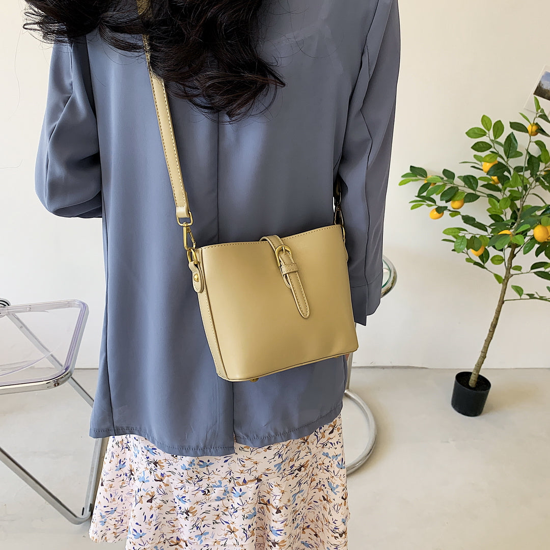 Modern strap style PU leather bucket bag