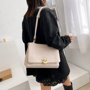 Handle-through flap dual-compartment PU leather crossbody bag