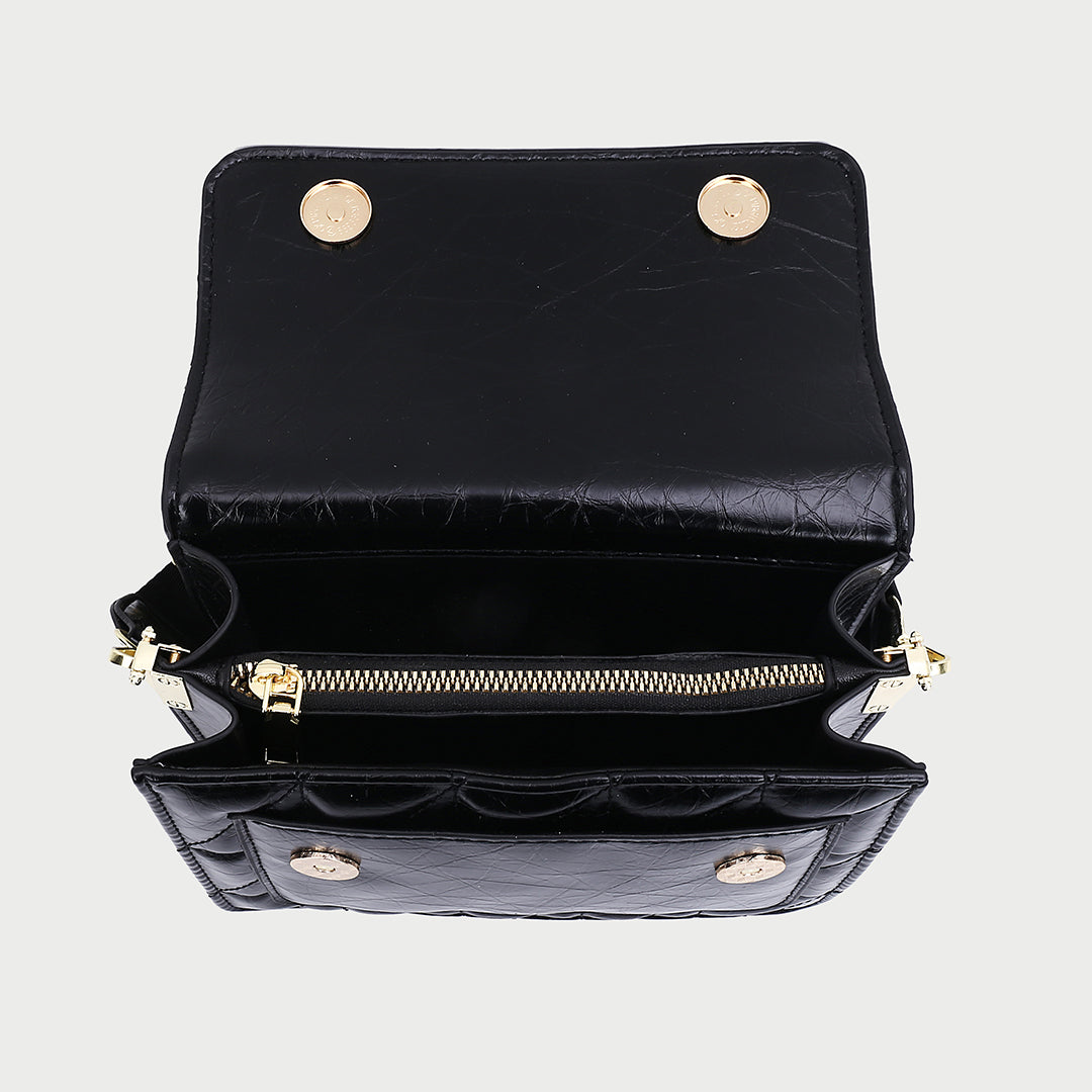 Flap style dual compartment quilted PU leather crossbody bag