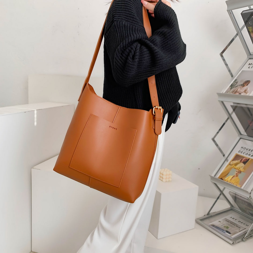 Minimalistic front pocket streamlined 2-in-1 PU leather bucket bag