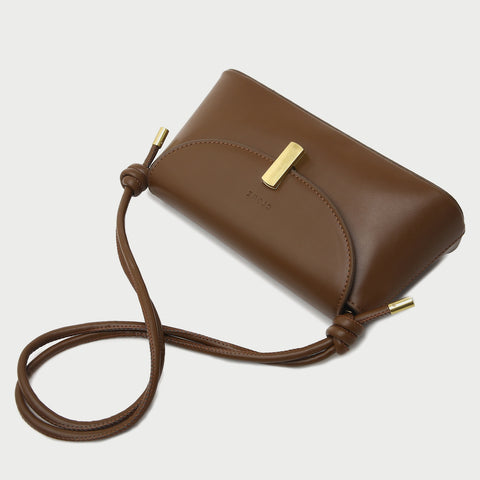 Metal clasp flap knotted strap PU leather shoulder bag