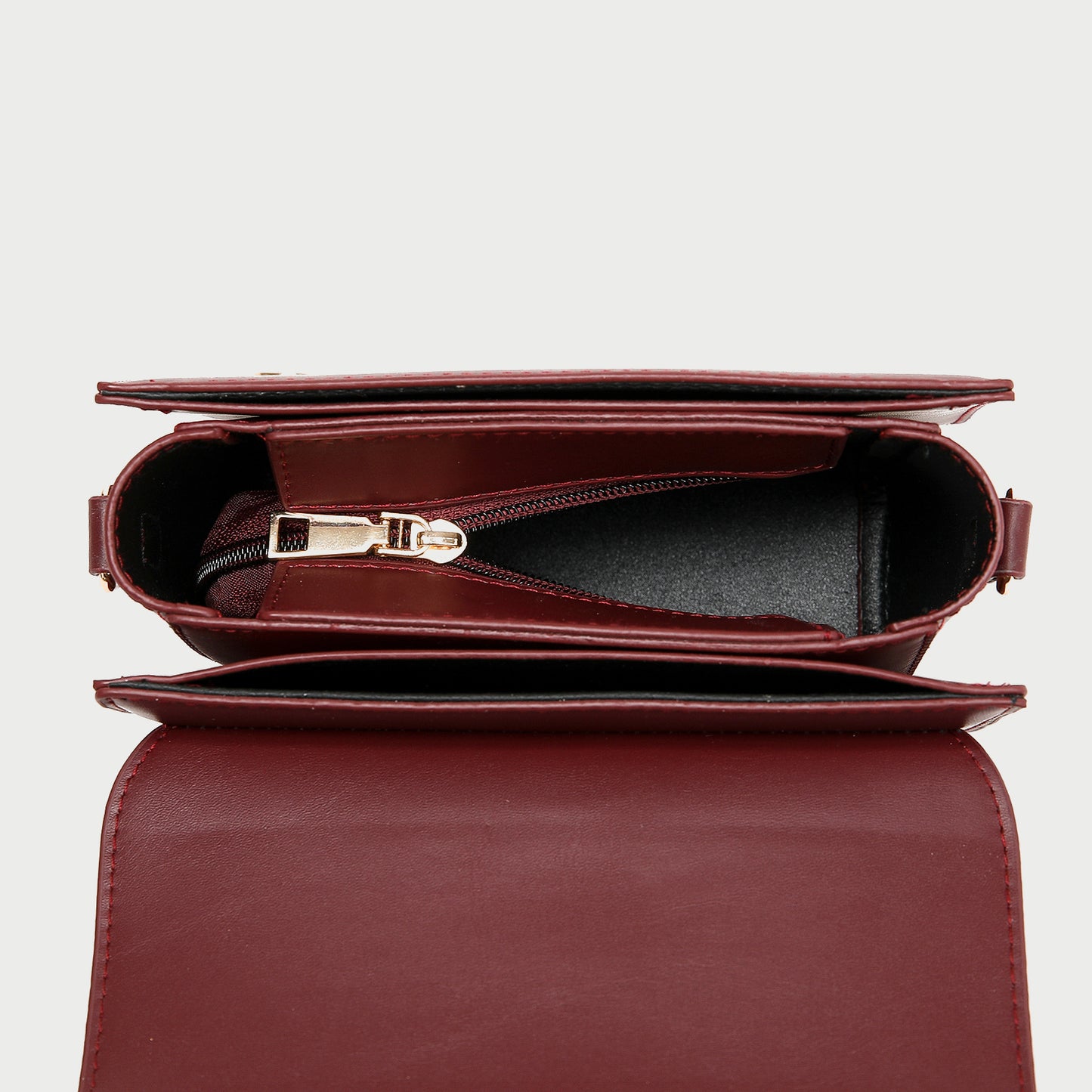 Knotted strap metal disc embellished PU leather crossbody bag
