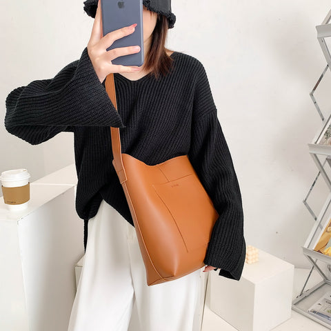Minimalistic front pocket streamlined 2-in-1 PU leather bucket bag