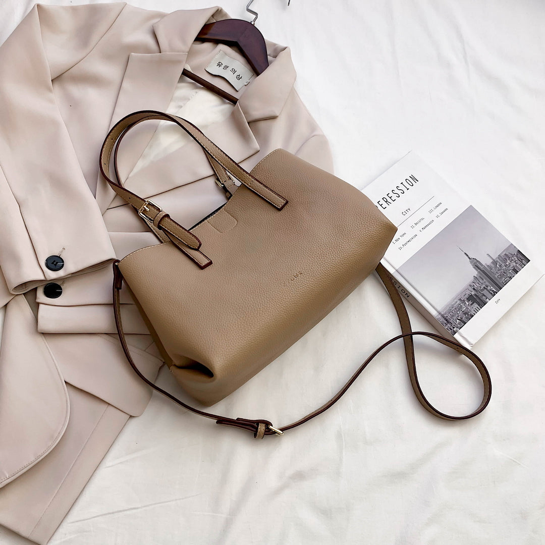 Minimal buckled handle dual compartment grained PU leather tote