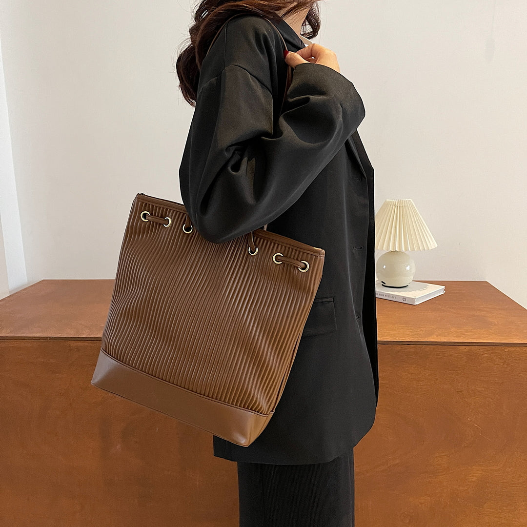 Eyelet strap detail tactile pleated PU leather shoulder bag