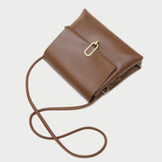 Oval hoop metallic closure dual compartment PU leather bag