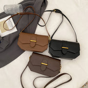 Retro saddle-inspired strap detail flap PU leather crossbody bag