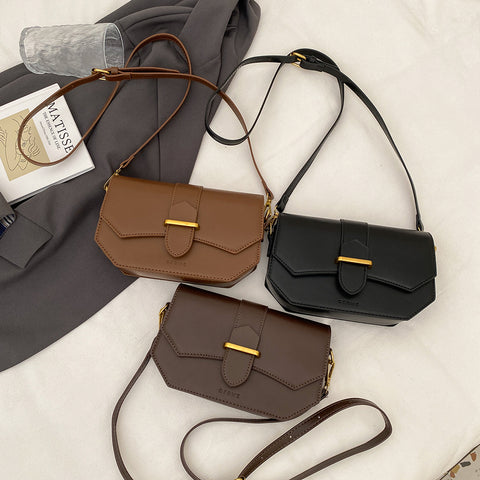 Retro saddle-inspired strap detail flap PU leather crossbody bag