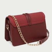 Knotted strap metal disc embellished PU leather crossbody bag