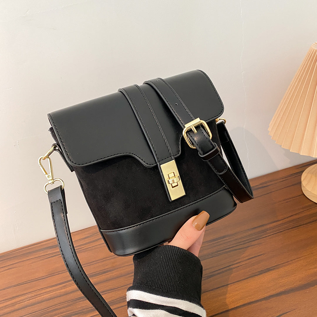 Metal turn-lock strap saddle flap PU leather bucket crossbody bag