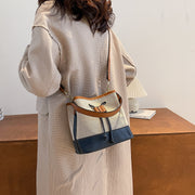 Modern drawstring detail colourblock PU leather canvas bucket bag