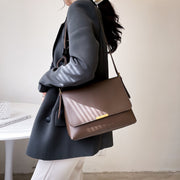 Metal hardware flap style PU leather crossbody bag