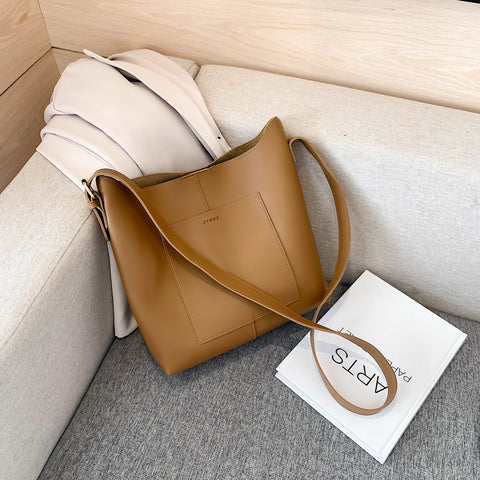 Minimalistic front pocket streamlined 2-in-1 PU leather bucket bag