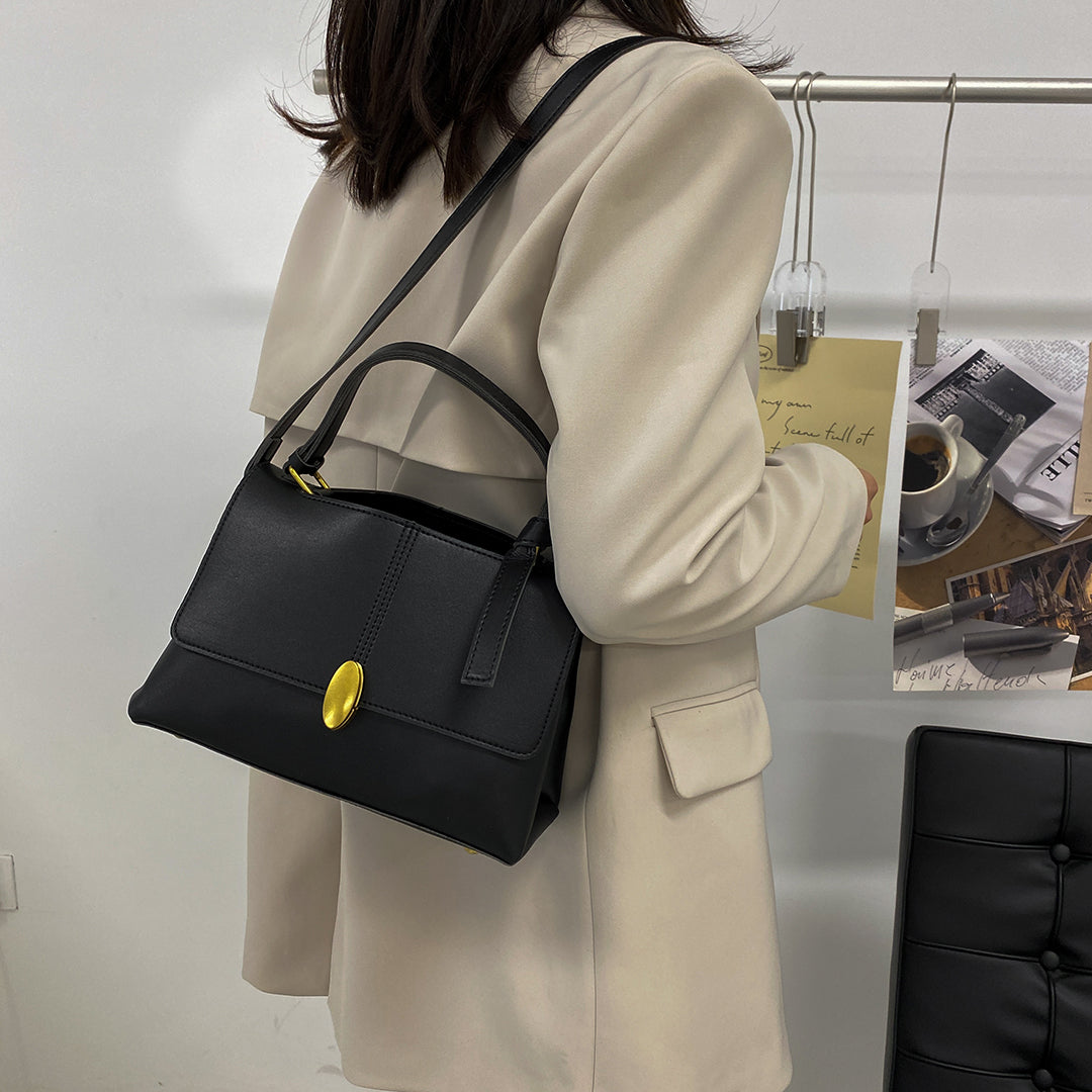 Oval metal clasp open-top flap PU leather crossbody bag