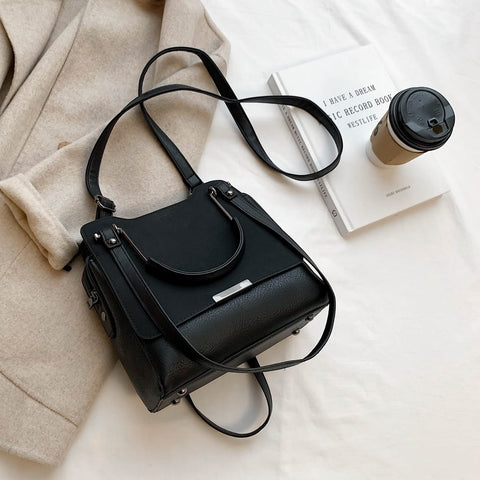 Front flap metal handle multi-strap zipped PU leather crossbody bag