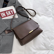Metal hardware flap style PU leather crossbody bag