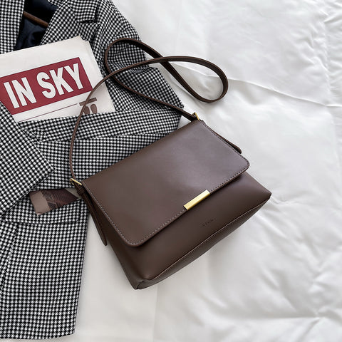 Metal hardware flap style PU leather crossbody bag