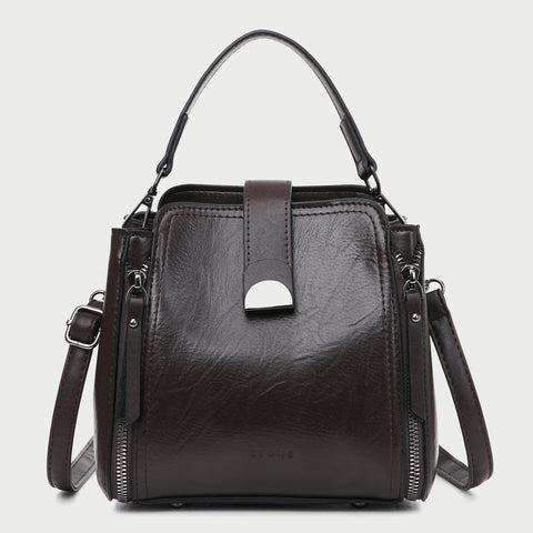 Half moon metal embellished strap zip side PU leather bucket bag