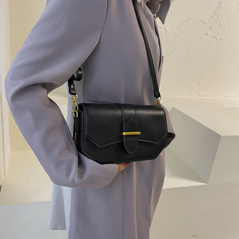 Retro saddle-inspired strap detail flap PU leather crossbody bag
