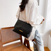 Metal hardware flap style PU leather crossbody bag