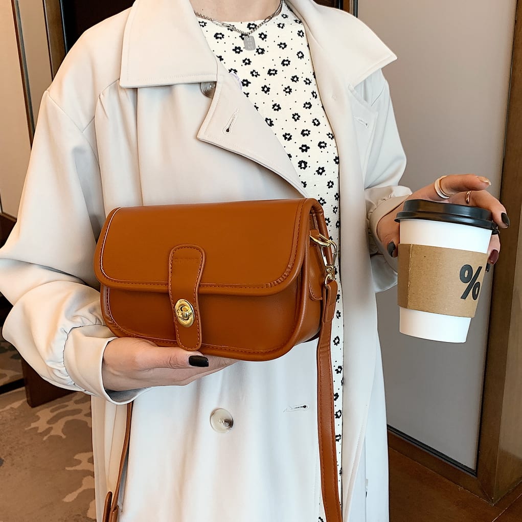 Metal turn-lock strap saddle style PU leather crossbody bag