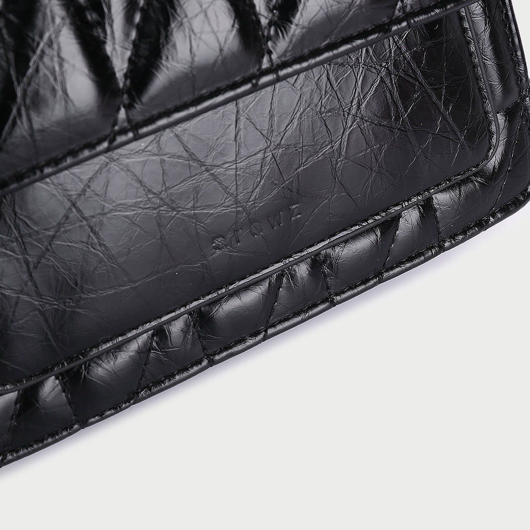 Flap style dual compartment quilted PU leather crossbody bag