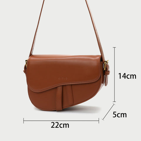 Retro strap detail flap sculptural PU leather saddle bag