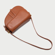 Retro strap detail flap sculptural PU leather saddle bag