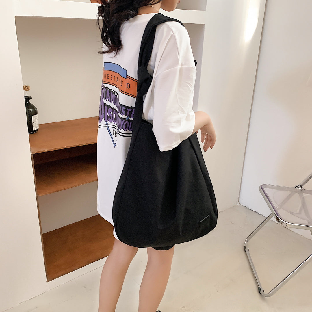 Knotted strap roomy canvas hobo bag