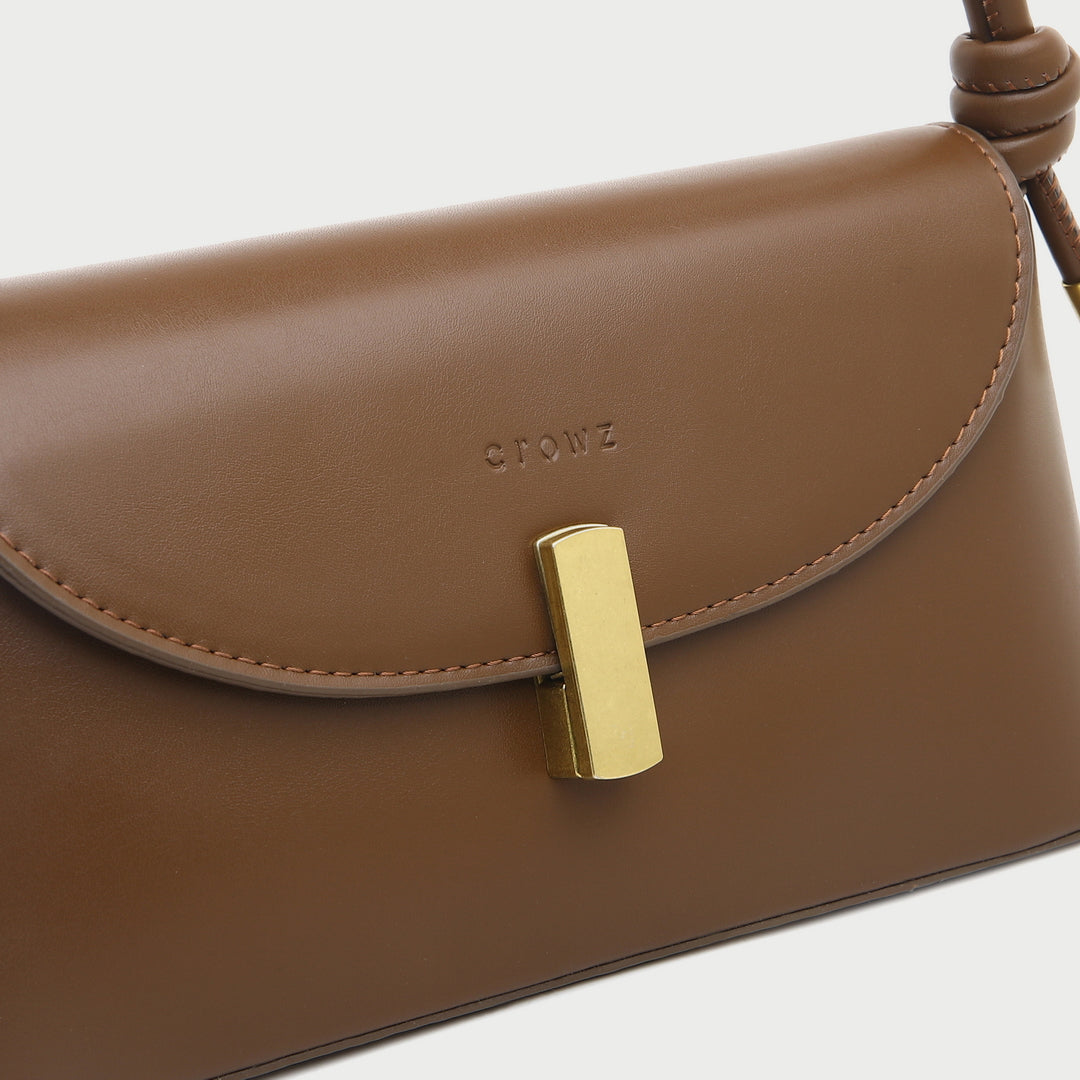 Metal clasp flap knotted strap PU leather shoulder bag